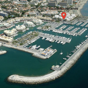 Holiday Rental Apartment Located in Puerto Marina with Sea Views, First Line of Beach.